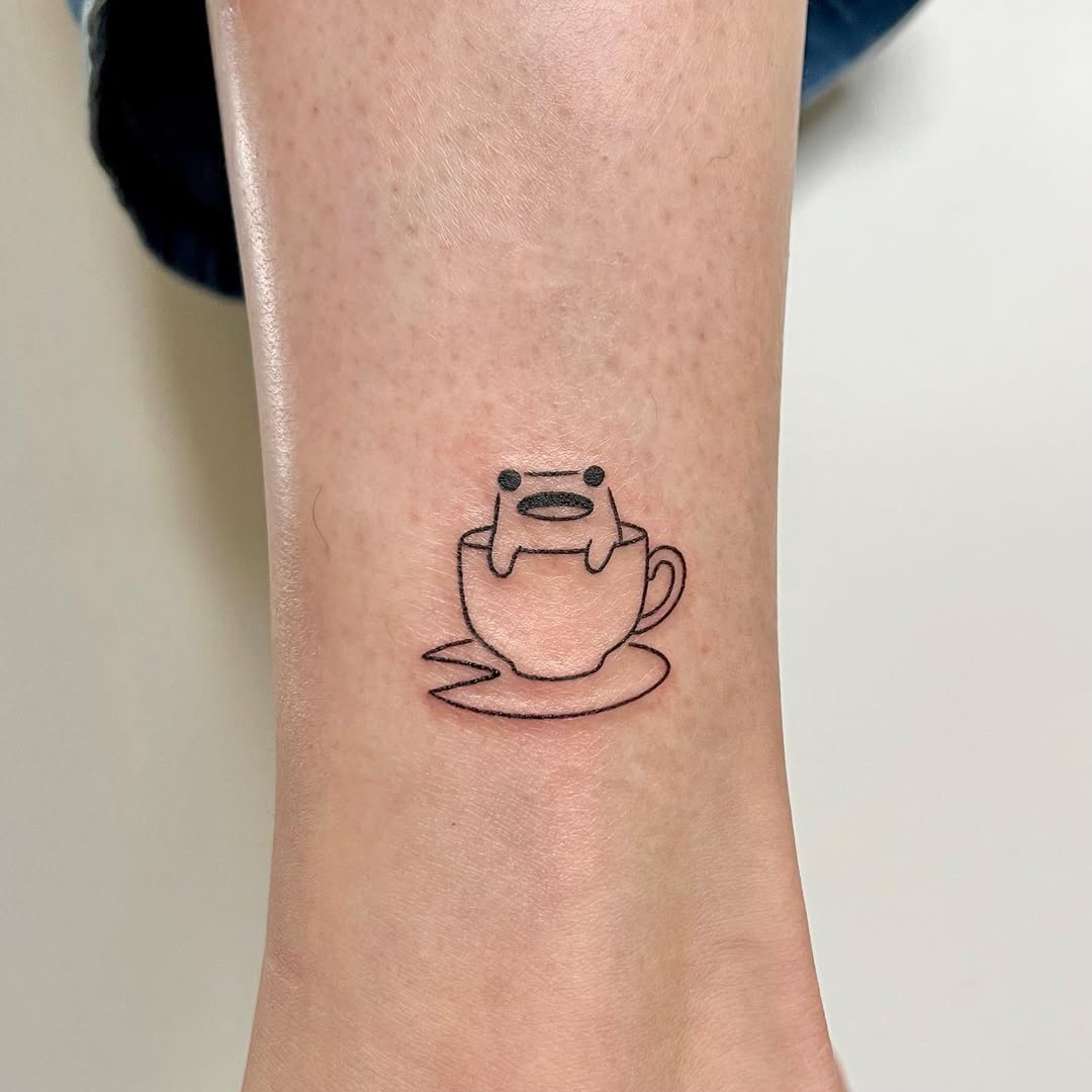 Adorable minimalist coffee cup tattoo to love