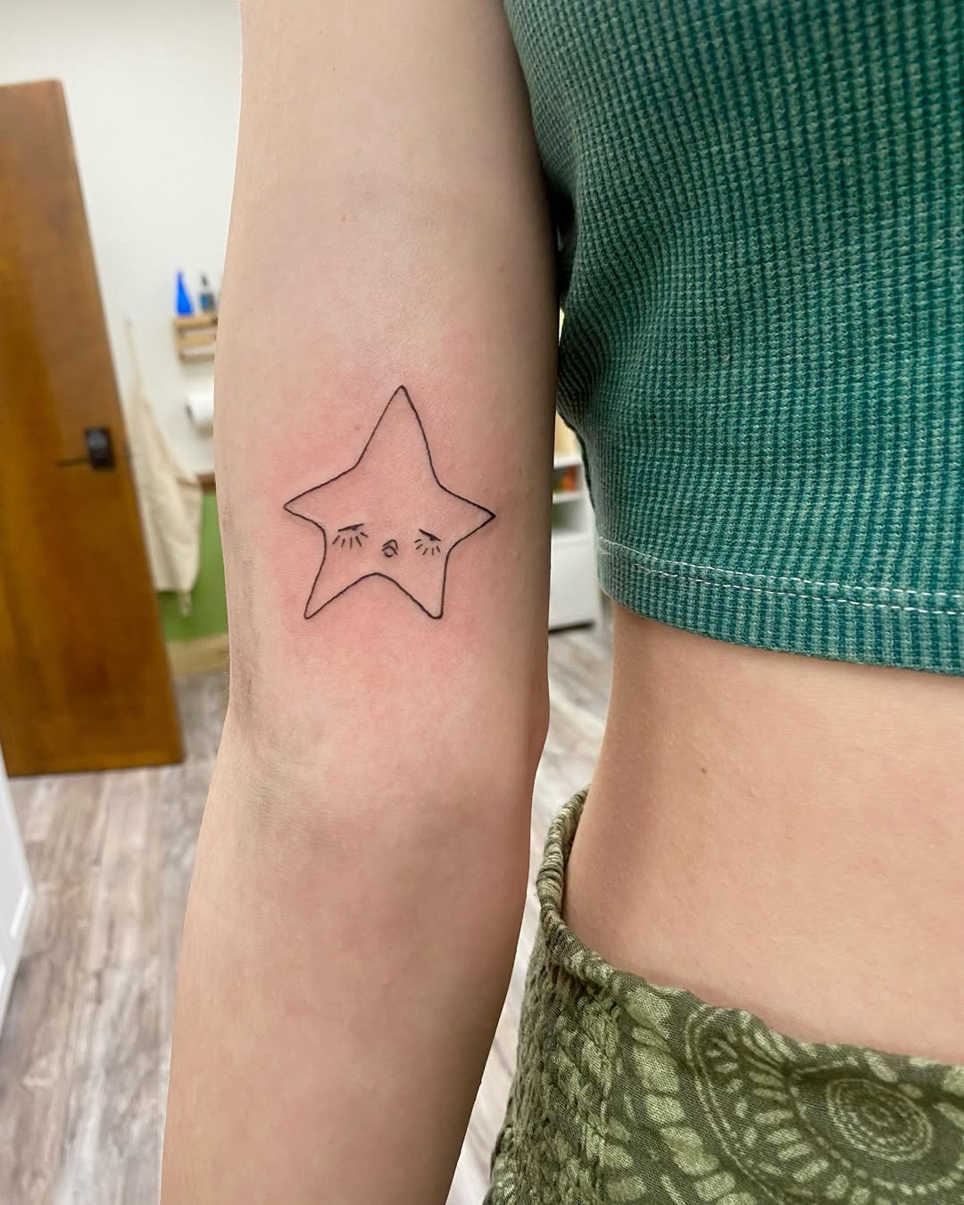 Charming star tattoo with expressive features