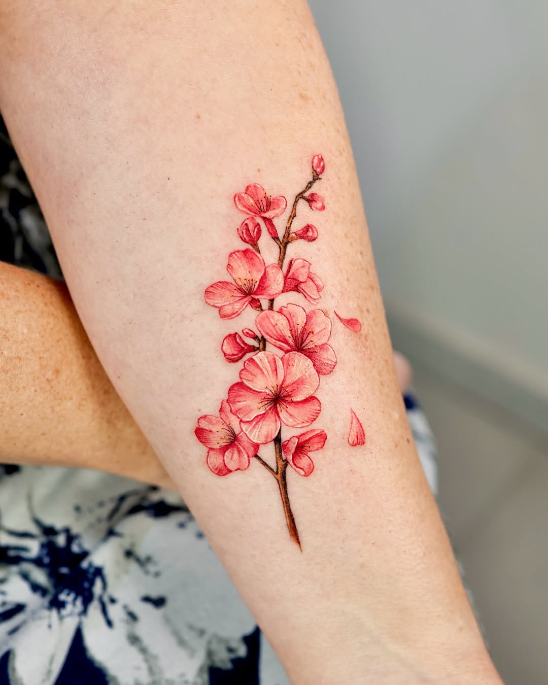 Stunning cherry blossom forearm tattoo design