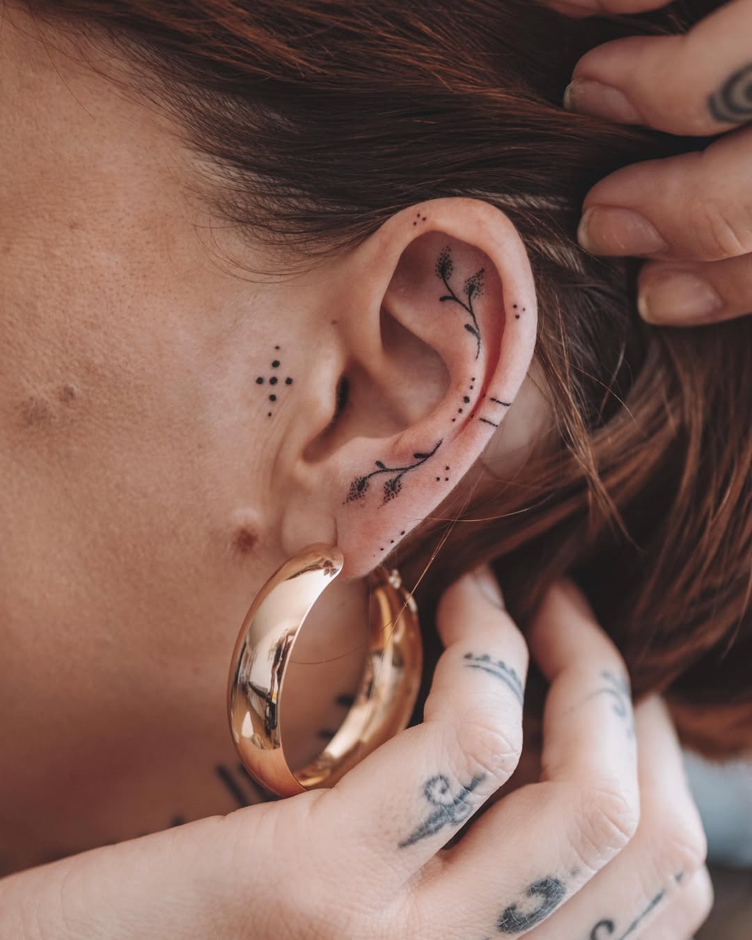 Elegant Floral Designs Adorning the Ear