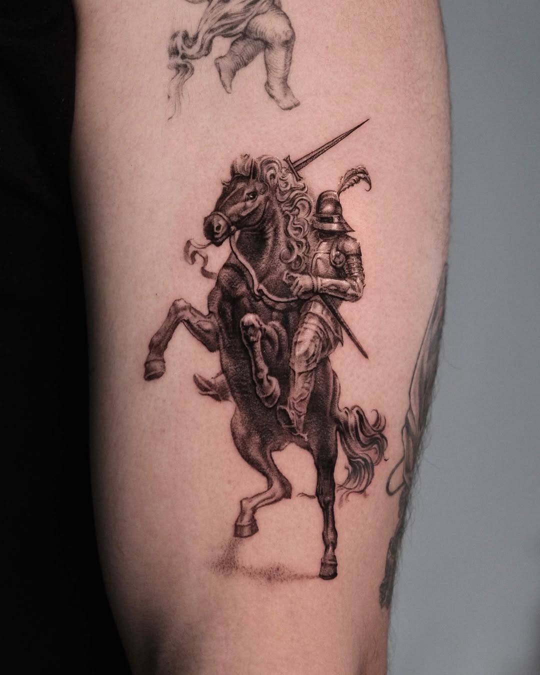 Intricate horse knight tattoo on the arm