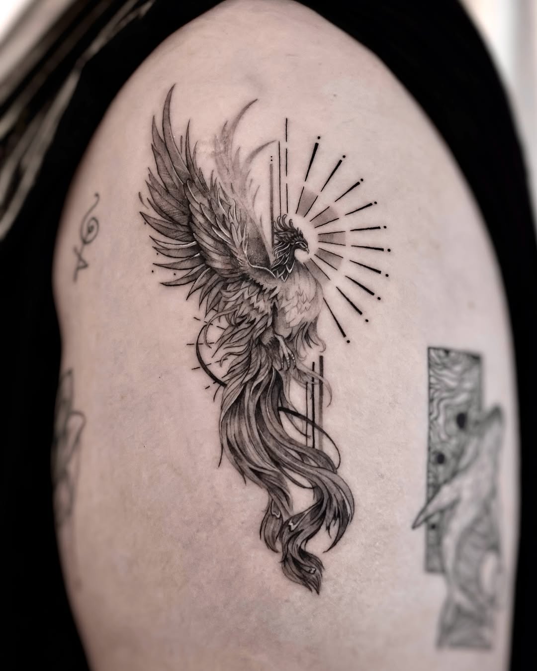 Stunning phoenix tattoo radiates power and rebirth