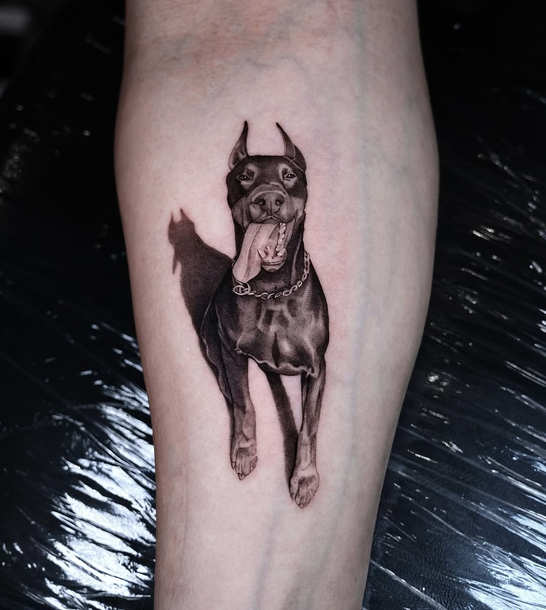 A striking realistic Doberman tattoo design