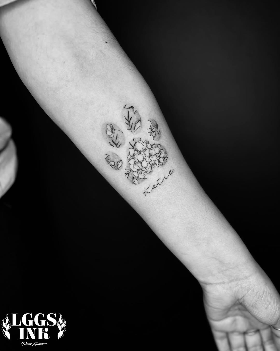 Unique paw print floral tattoo design