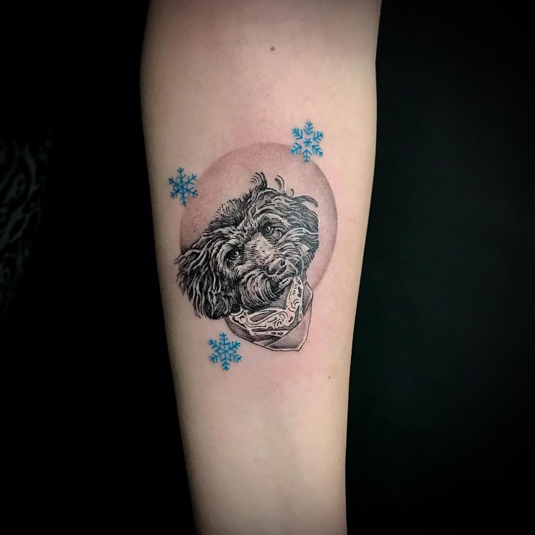 Stylish poodle tattoo with winter accents