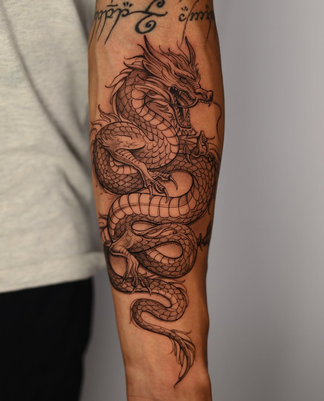 Intricate Dragon Tattoo with Fierce Detailing