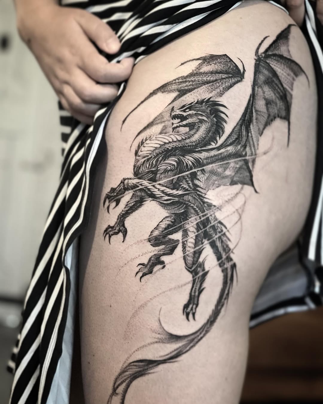 Epic dragon tattoo with intricate details