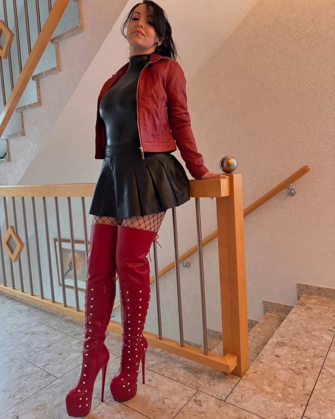 Chic red over-the-knee boots with leather ensemble