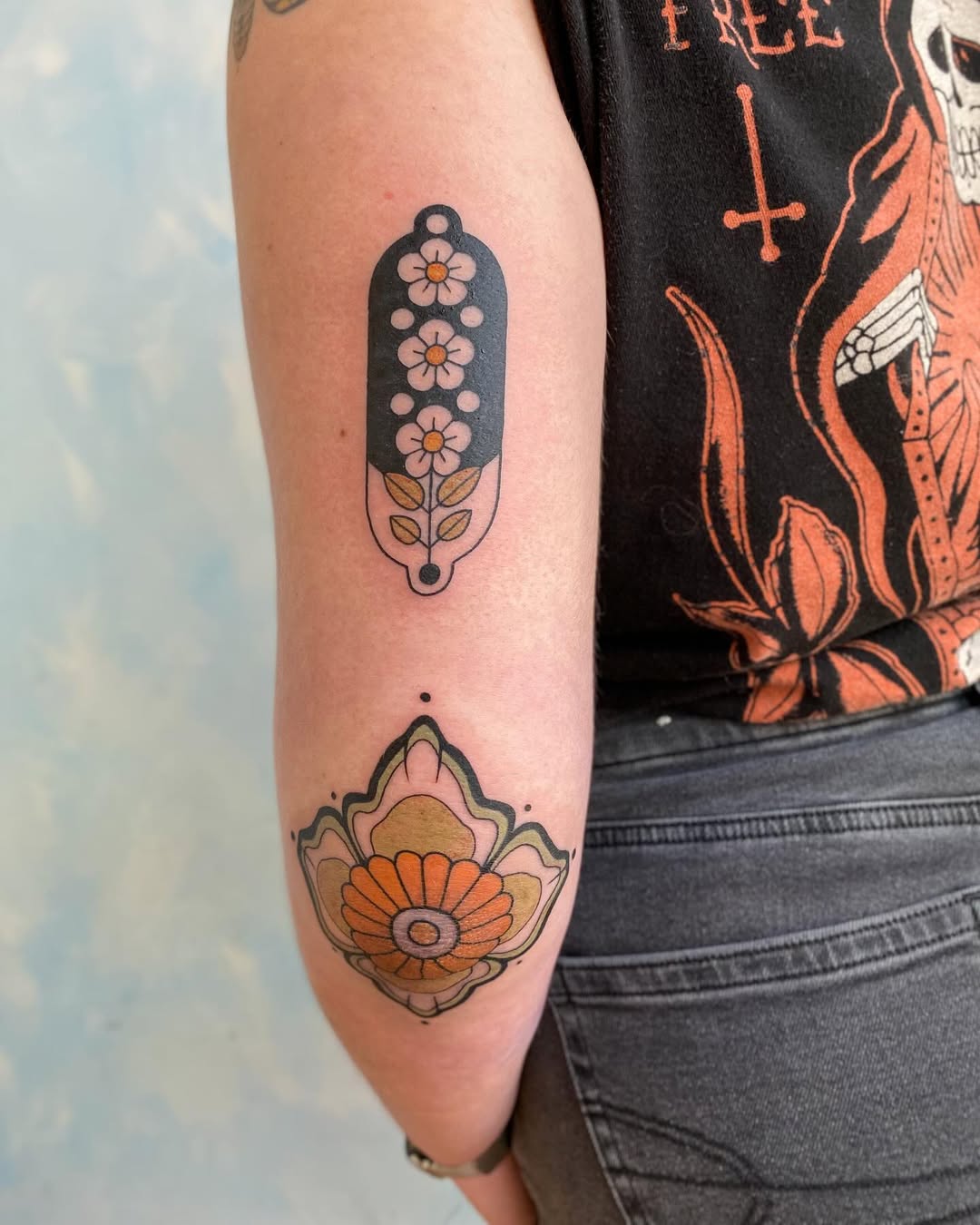 Vibrant floral elbow tattoo designs for unique aesthetics