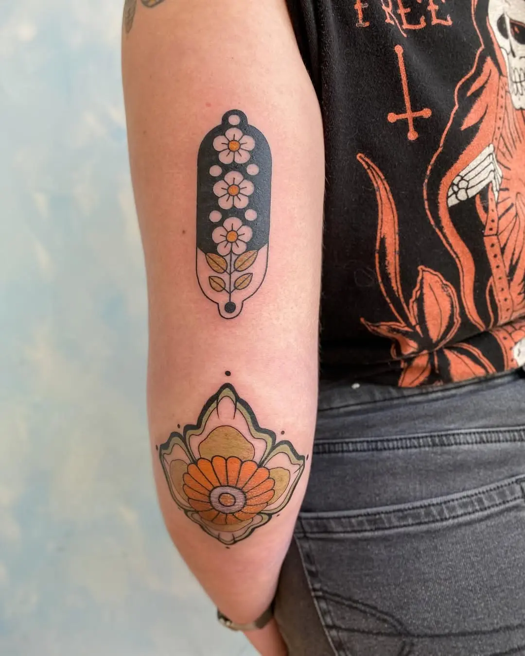 Vibrant floral elbow tattoo designs for unique aesthetics