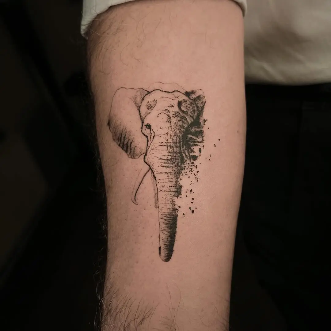Elegant Minimalist Elephant Head Tattoo Design