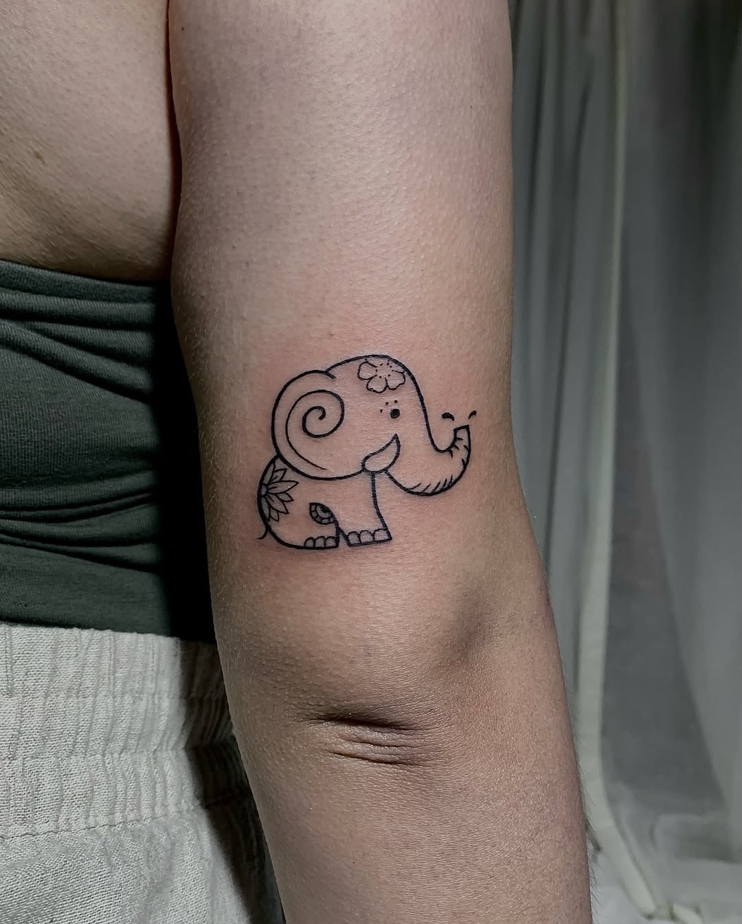 Charming Minimalist Elephant Tattoo Design