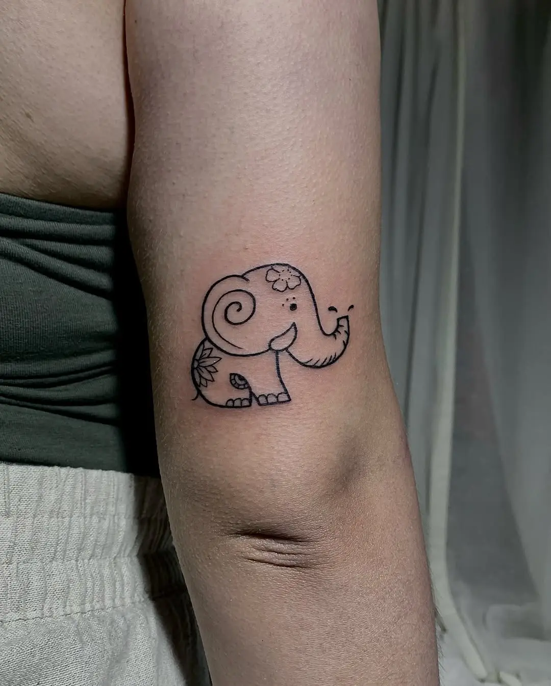 Charming Minimalist Elephant Tattoo Design