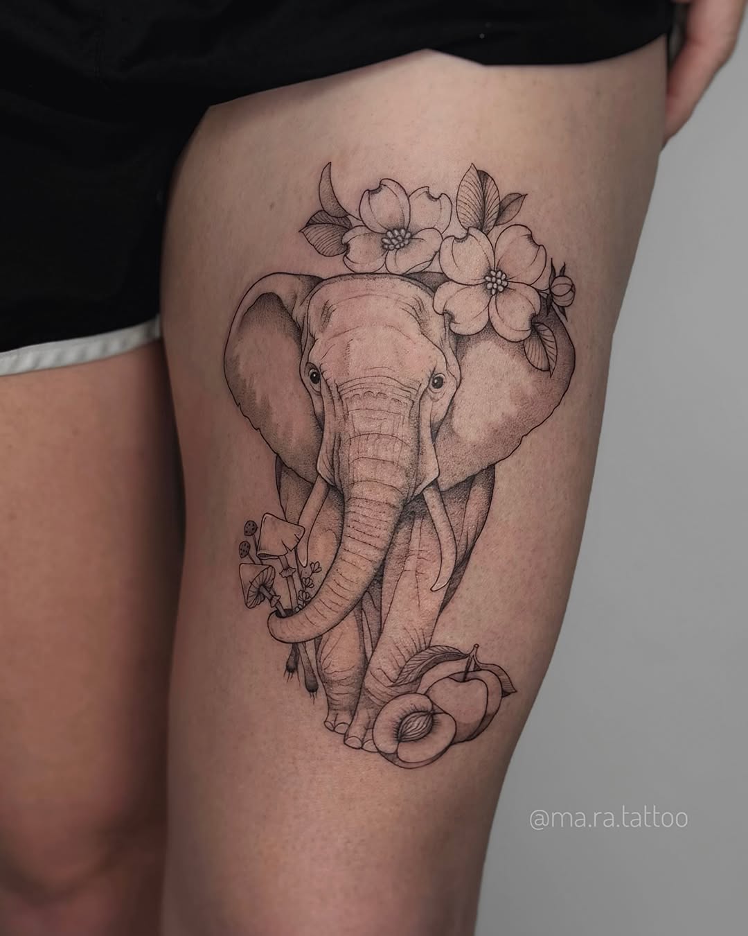 Elegant tattoo featuring an artistic elephant design