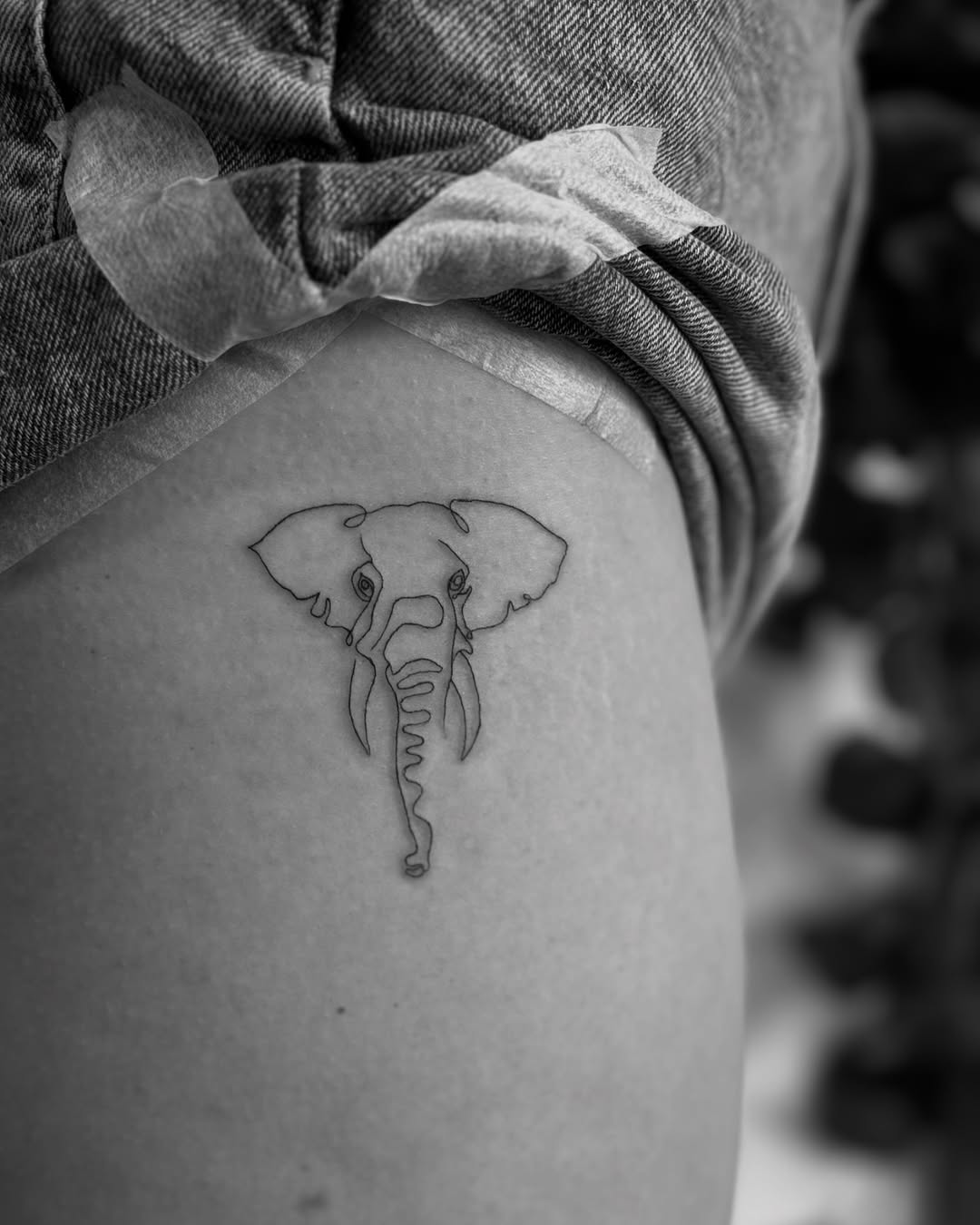 Elegant minimalist elephant tattoo design