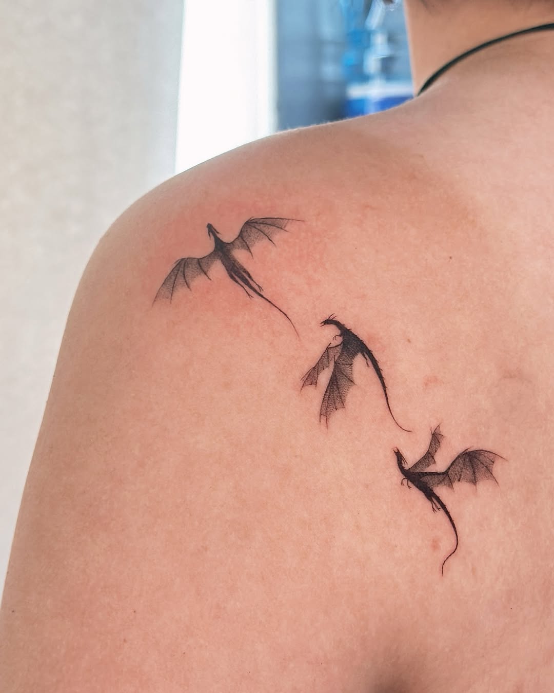 Stunning silhouette dragon tattoos in motion