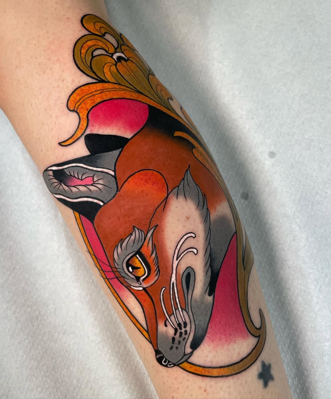 Vibrant fox tattoo with intricate detailing