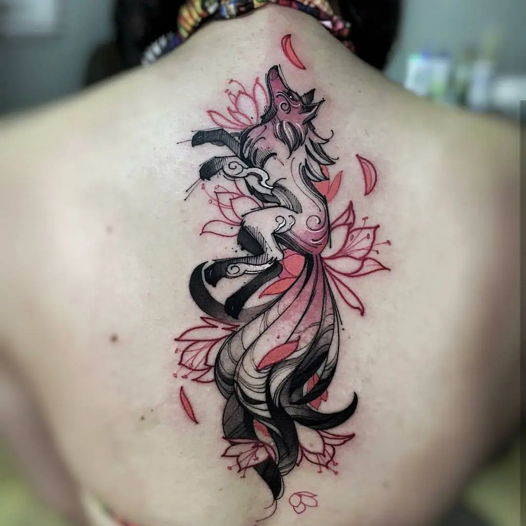 Graceful fox tattoo with floral elements