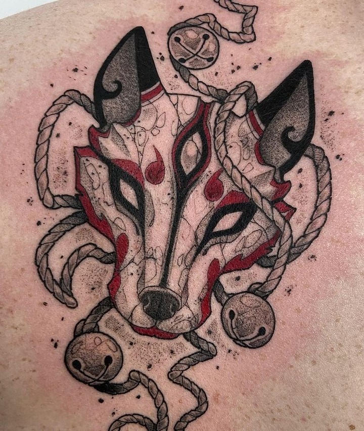 Intricate fox tattoo with playful elements