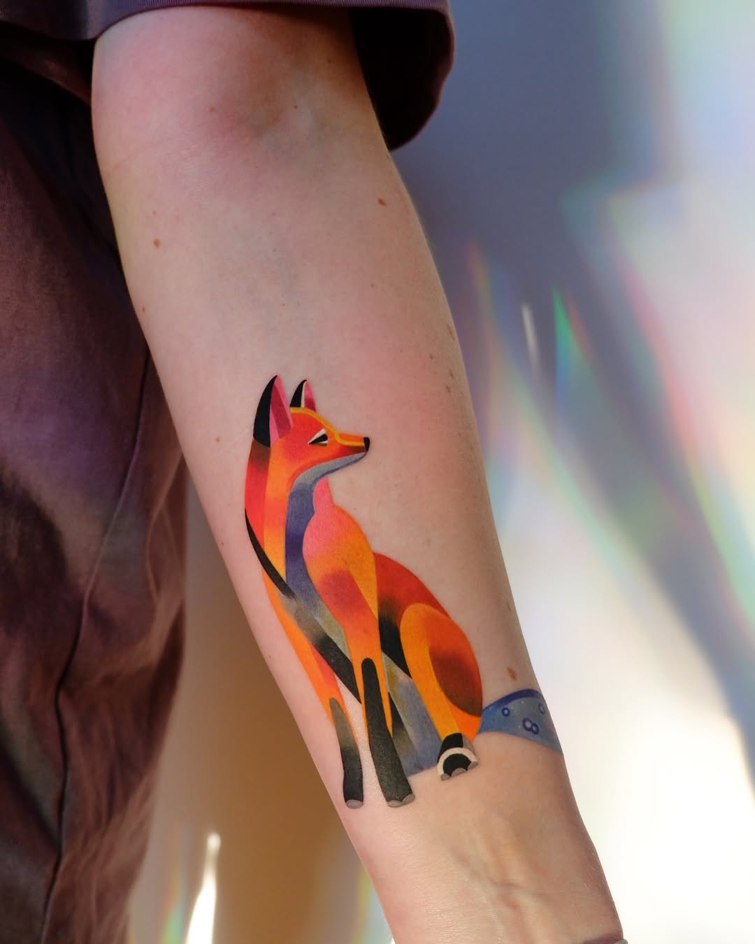 Stylish fox tattoo with vibrant color composition