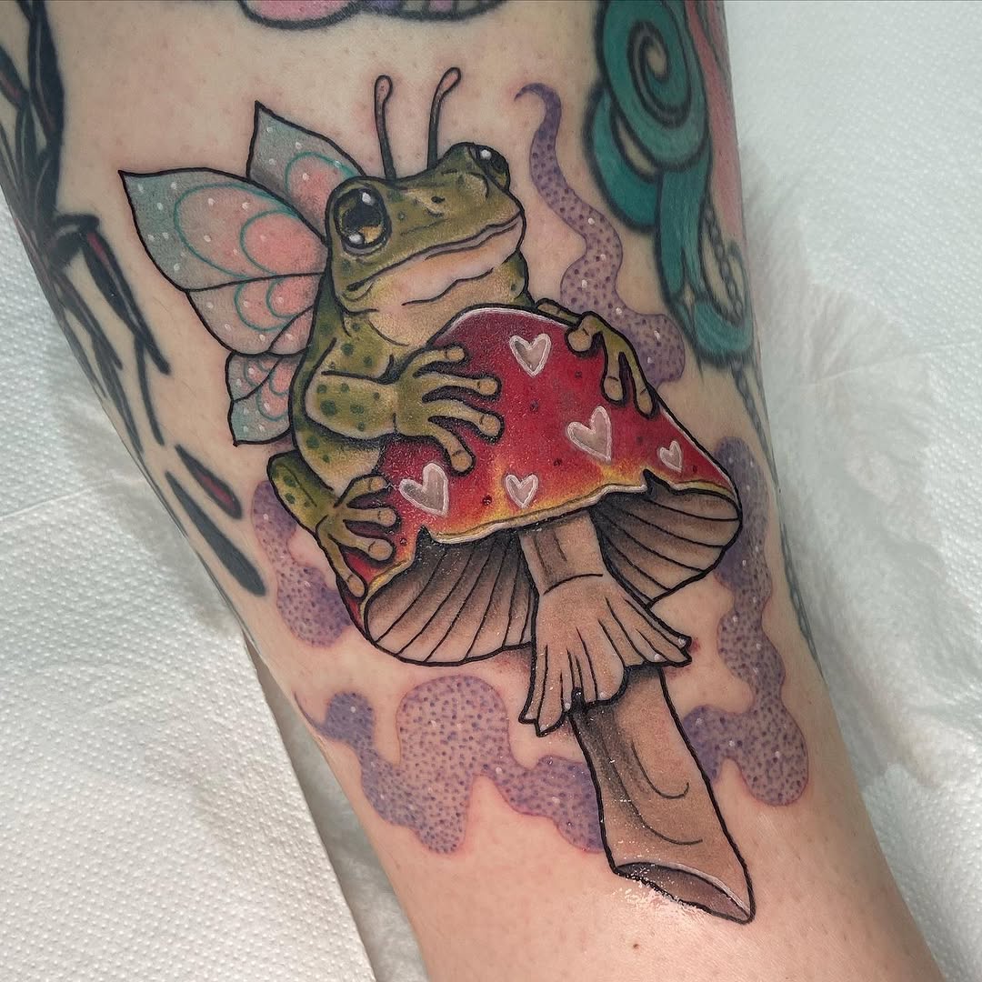 Whimsical frog on mushroom with fairy wings