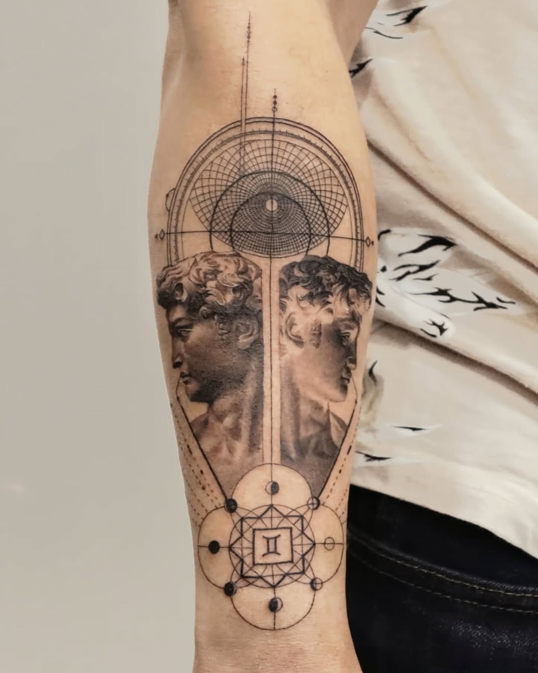 Stylish Gemini tattoo blending art and astrology