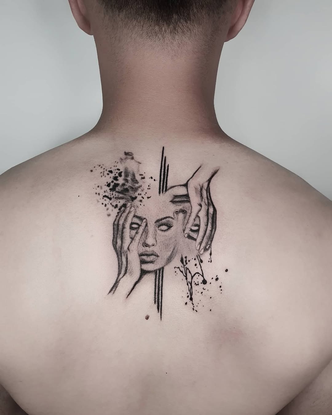 Stunning Gemini-Inspired Back Tattoo Design