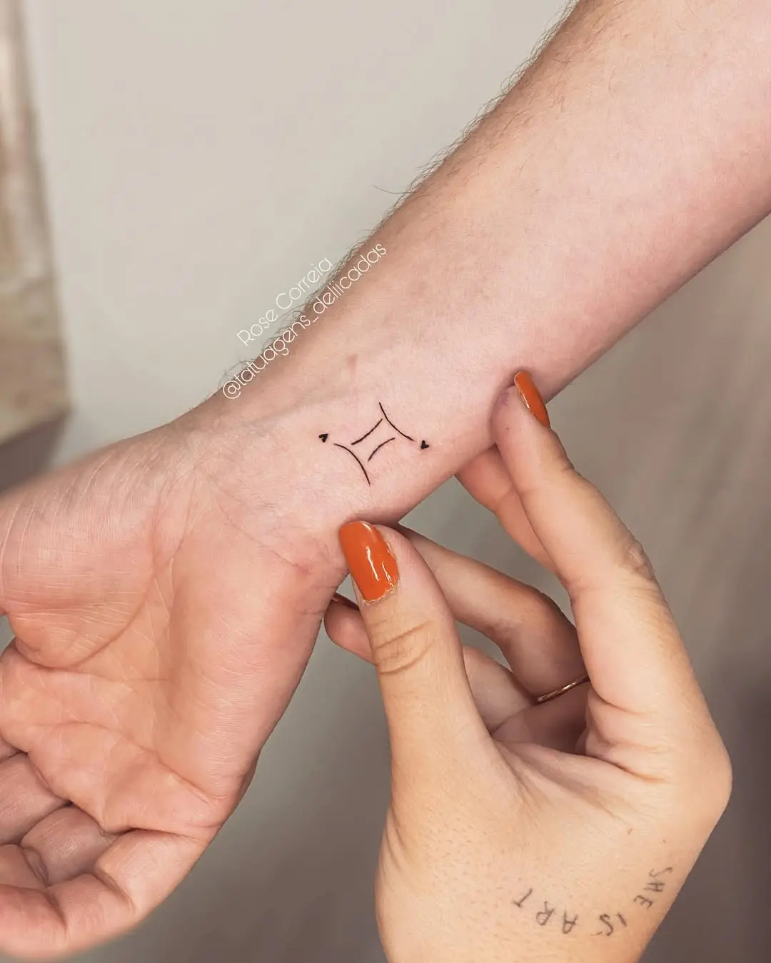 Minimalist Gemini Tattoo Design on Wrist
