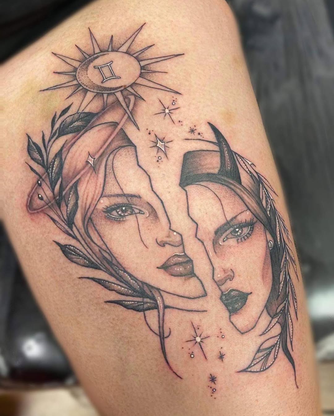 Intricate Gemini duality tattoo design