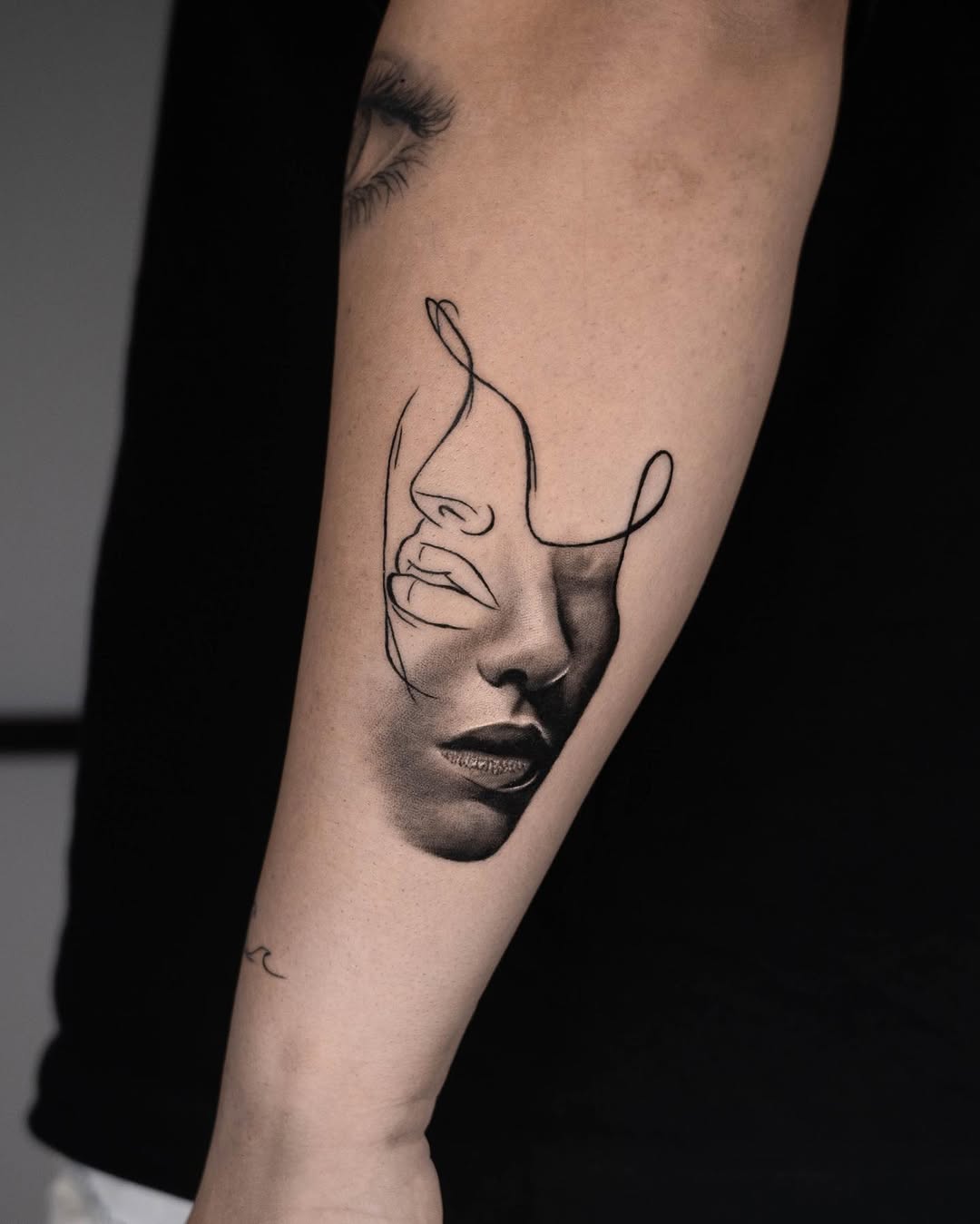 Unique minimalist Gemini face tattoo design