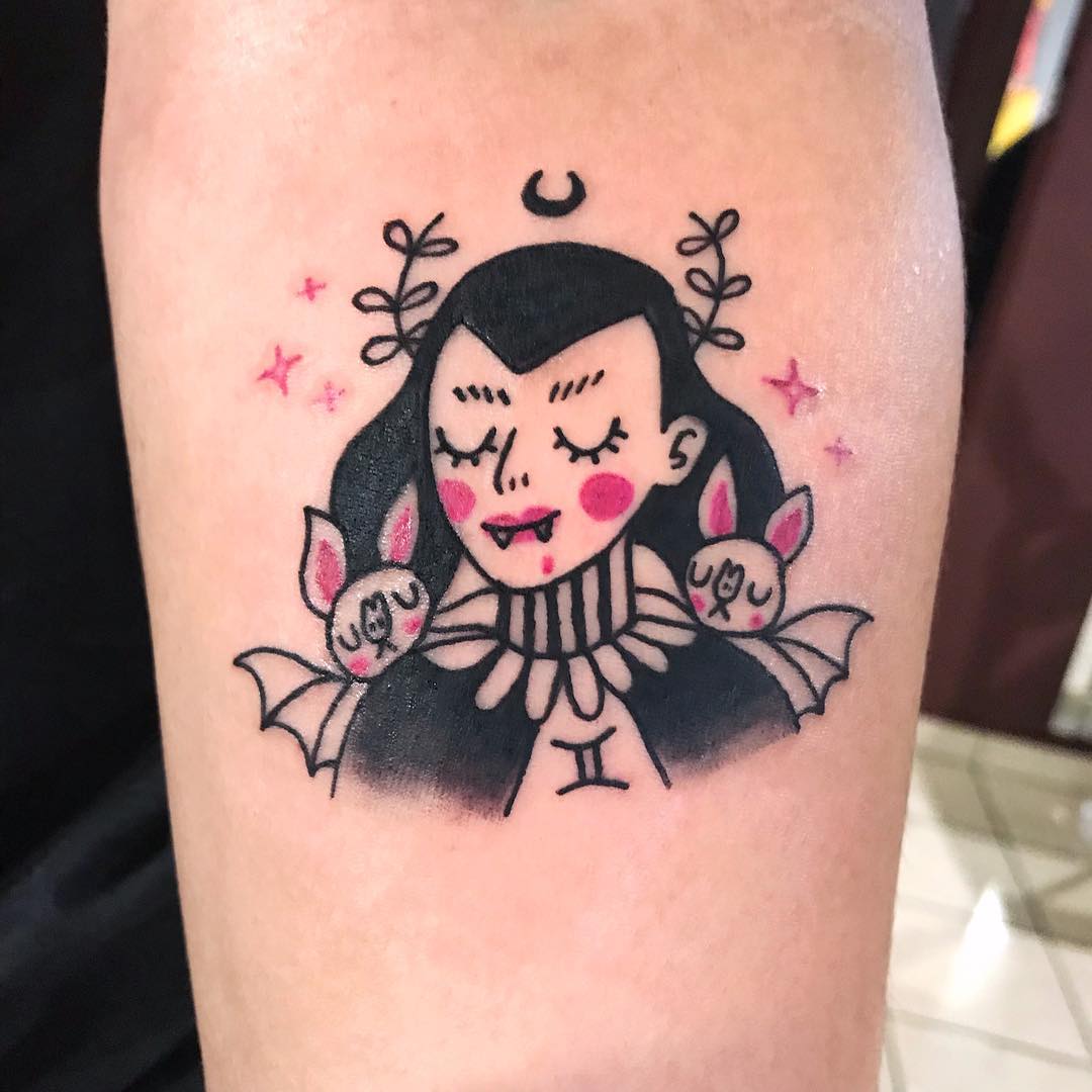 Unique Gemini Tattoo with Vampire Aesthetic