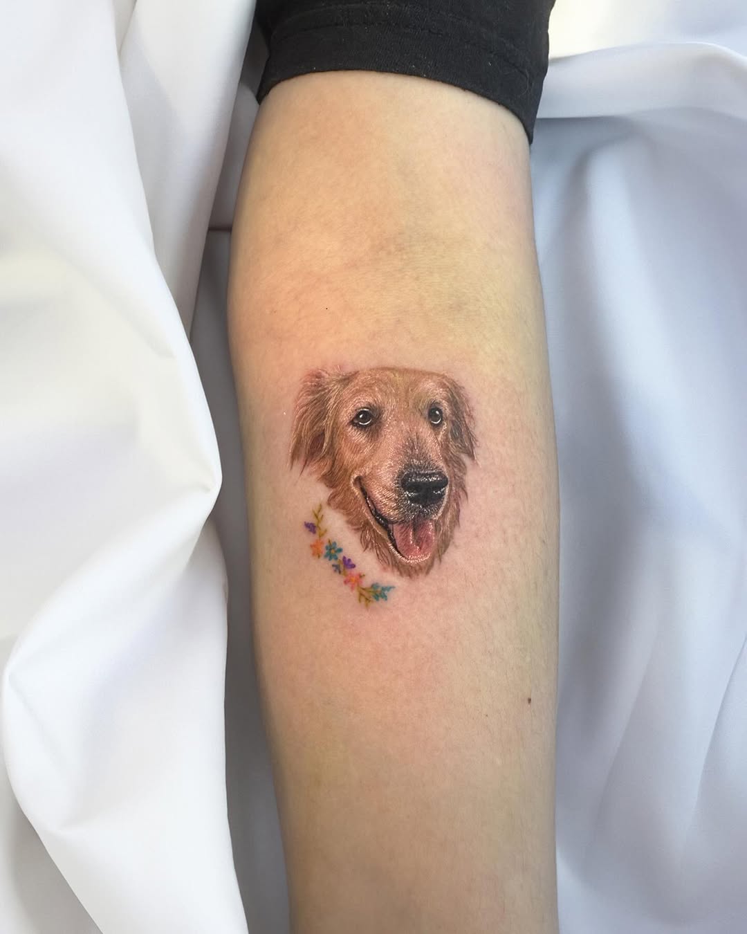 Charming Golden Retriever Tattoo with Floral Accents