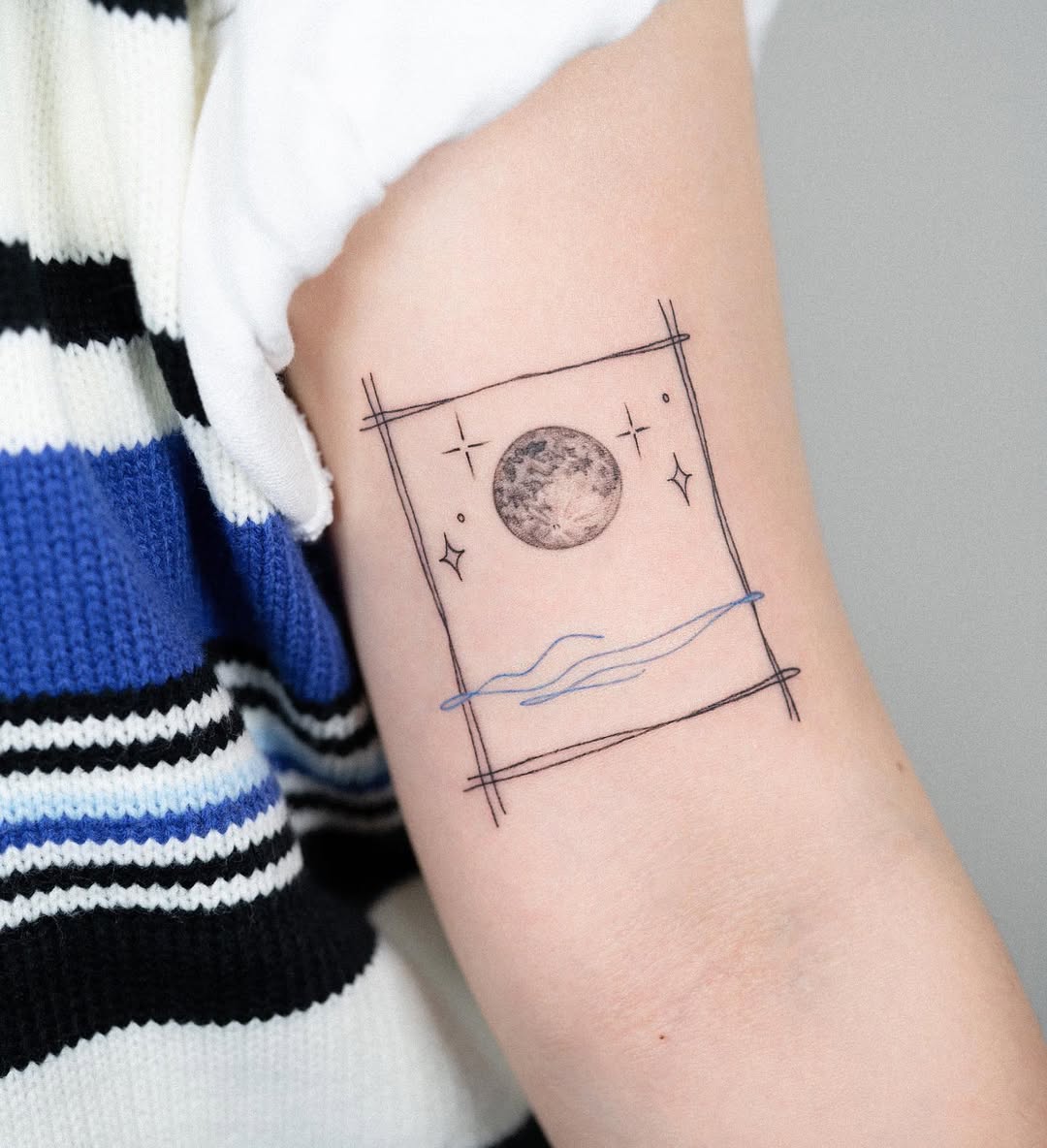 Artistic representation of a half moon tattoo