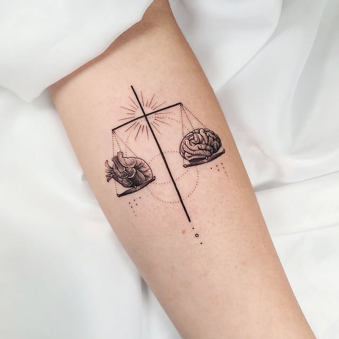 Symbolic heart and brain balance tattoo design