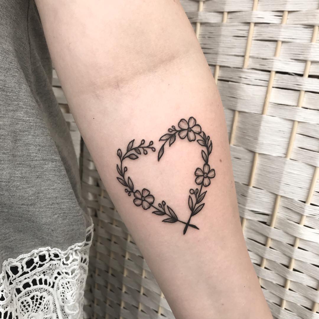 Delicate heart adorned with floral elements