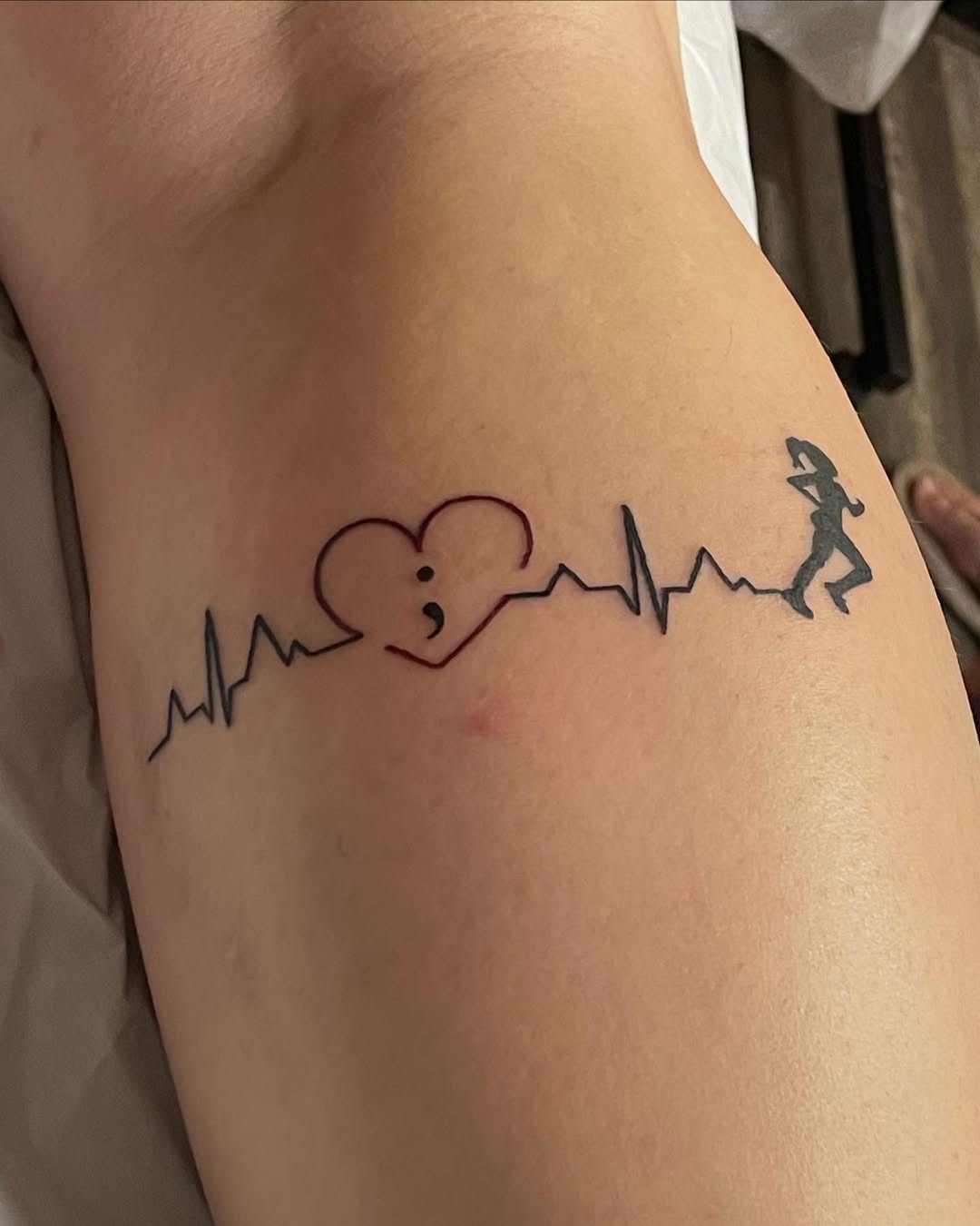 Heart Rate Tattoo with a Running Figure