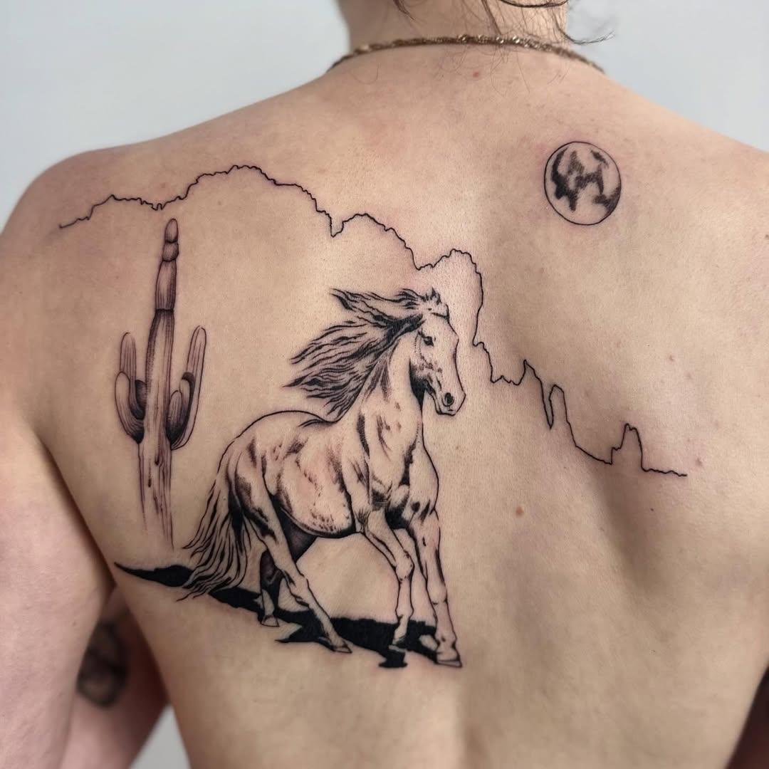 Majestic horse tattoo with desert elements