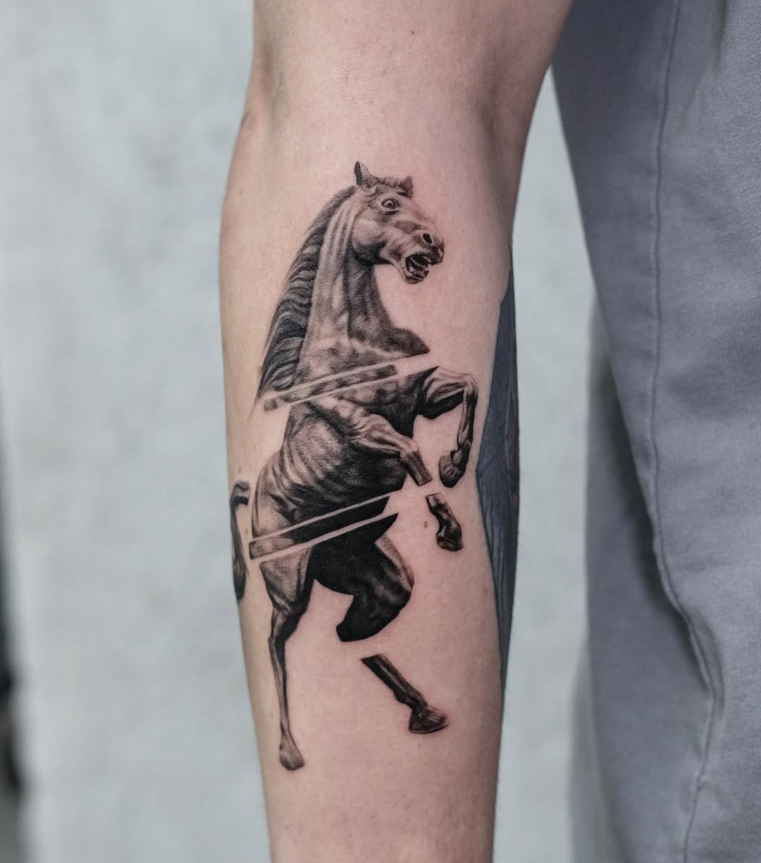 Dynamic horse tattoo with a fierce presence