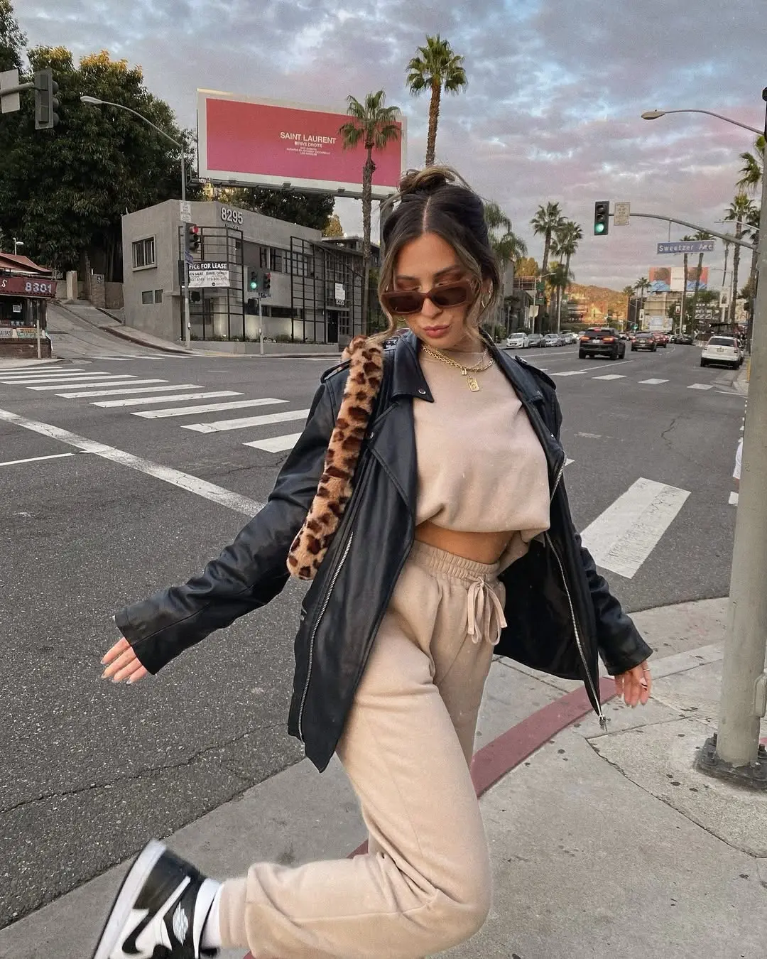 Chic street style with layered leather and luxe vibes