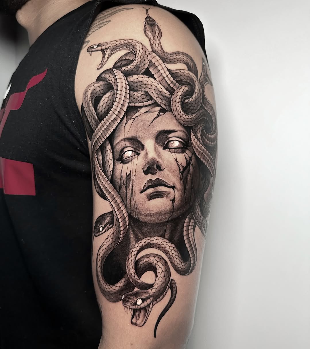 Striking Medusa Tattoo with Intricate Snake Details