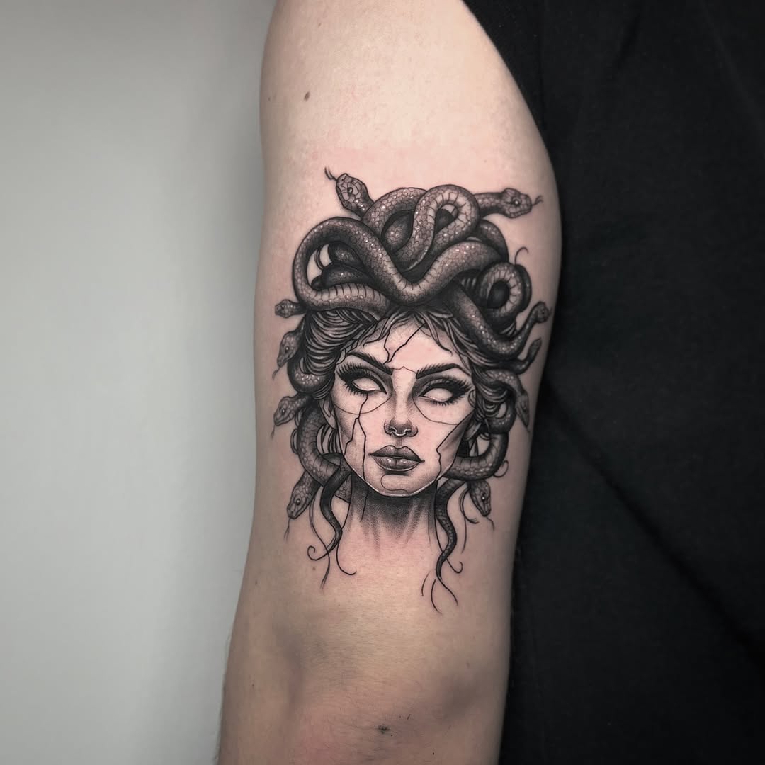 Striking Medusa Tattoo with Serpent Details