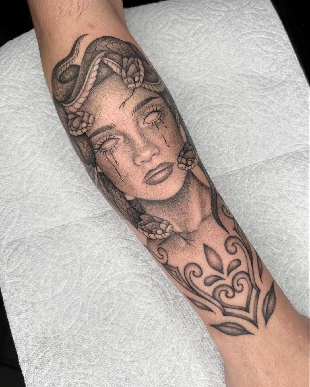 Elegant Medusa Tattoo with Striking Snake Detail