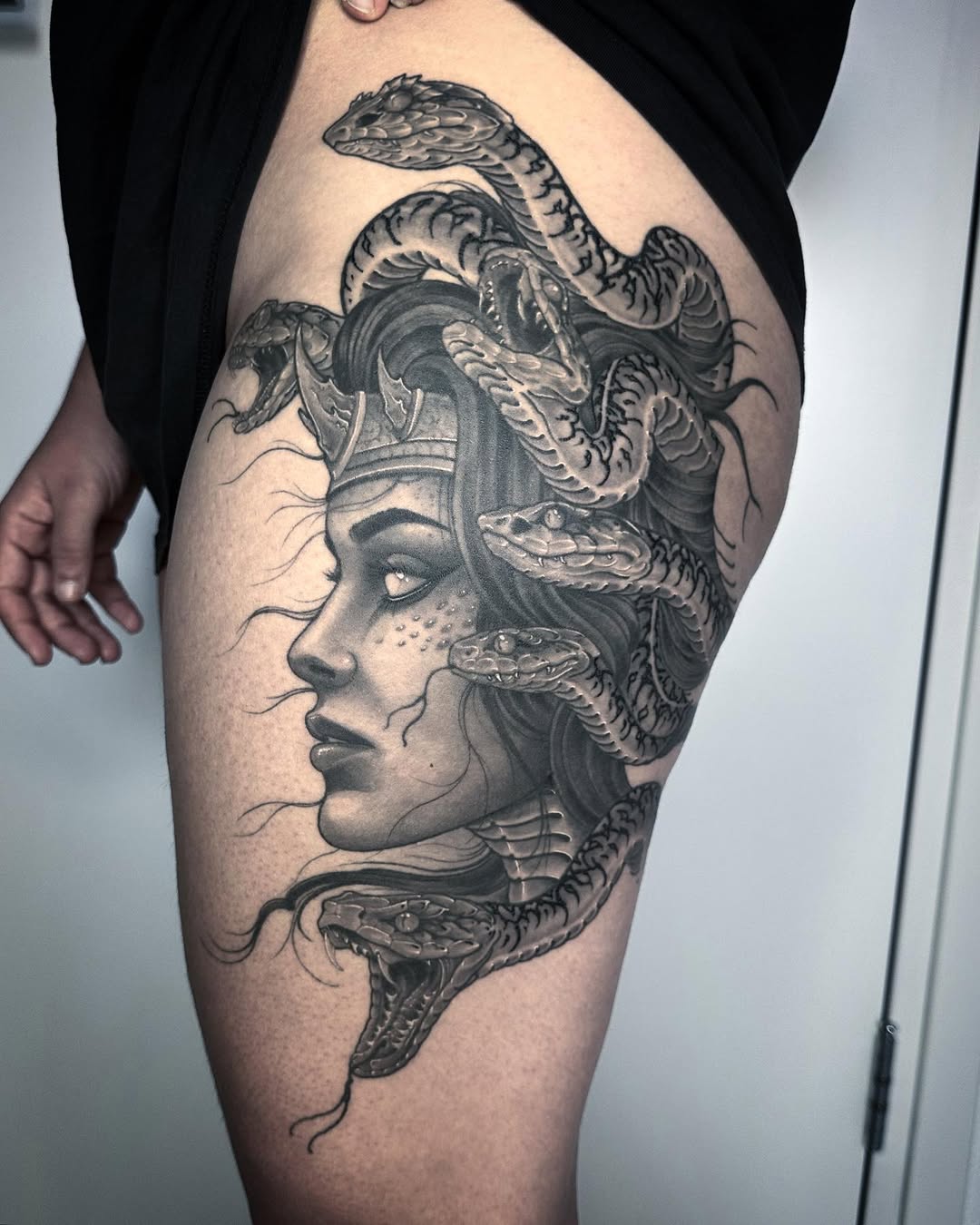 Intricate Medusa Tattoo with Fierce Snake Design