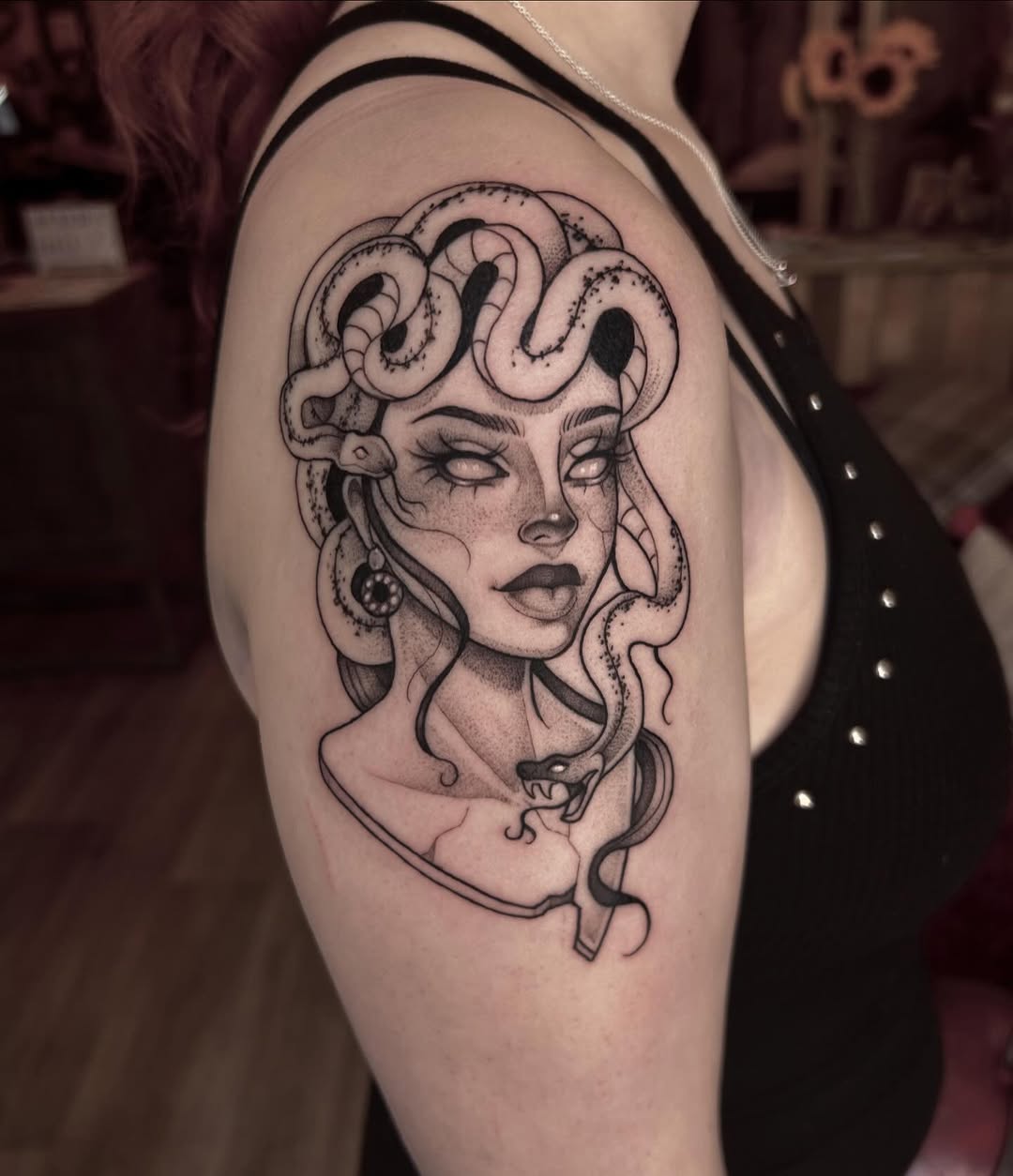 Stunning Medusa Tattoo with Serpentine Details