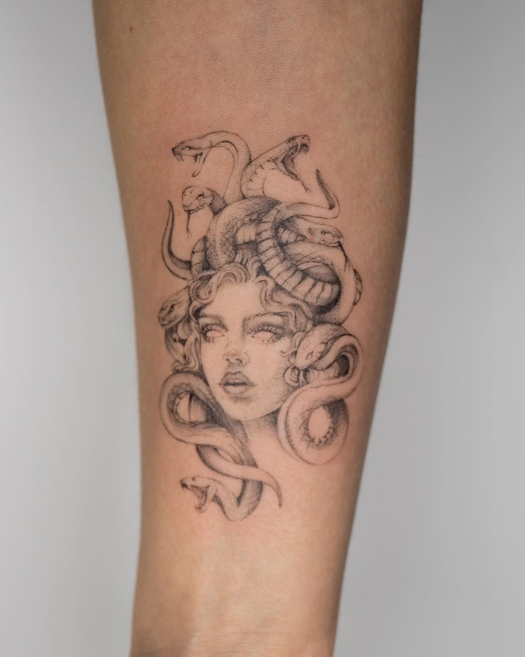 Intricate Medusa Tattoo with Serpentine Elegance