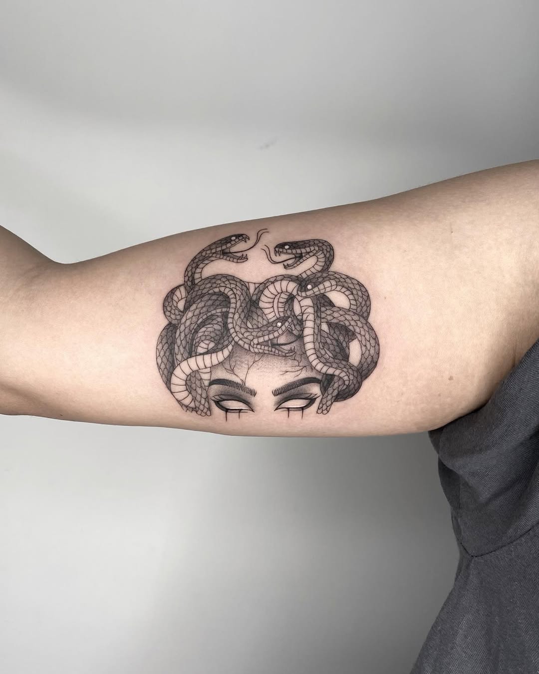 Intricate Medusa Tattoo with Serpents on Arm