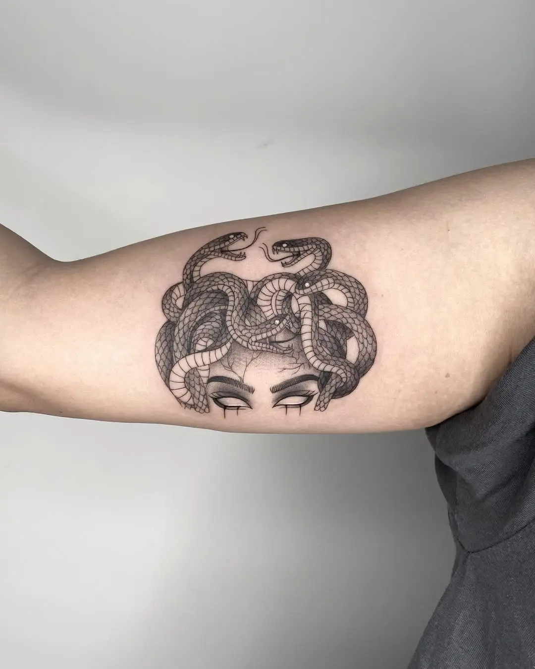Intricate Medusa Tattoo with Serpents on Arm