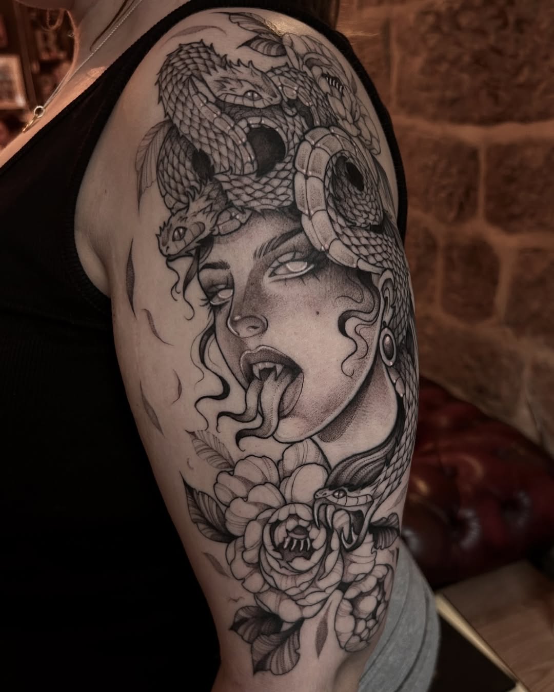 Striking Medusa Design with Serpents and Flowers