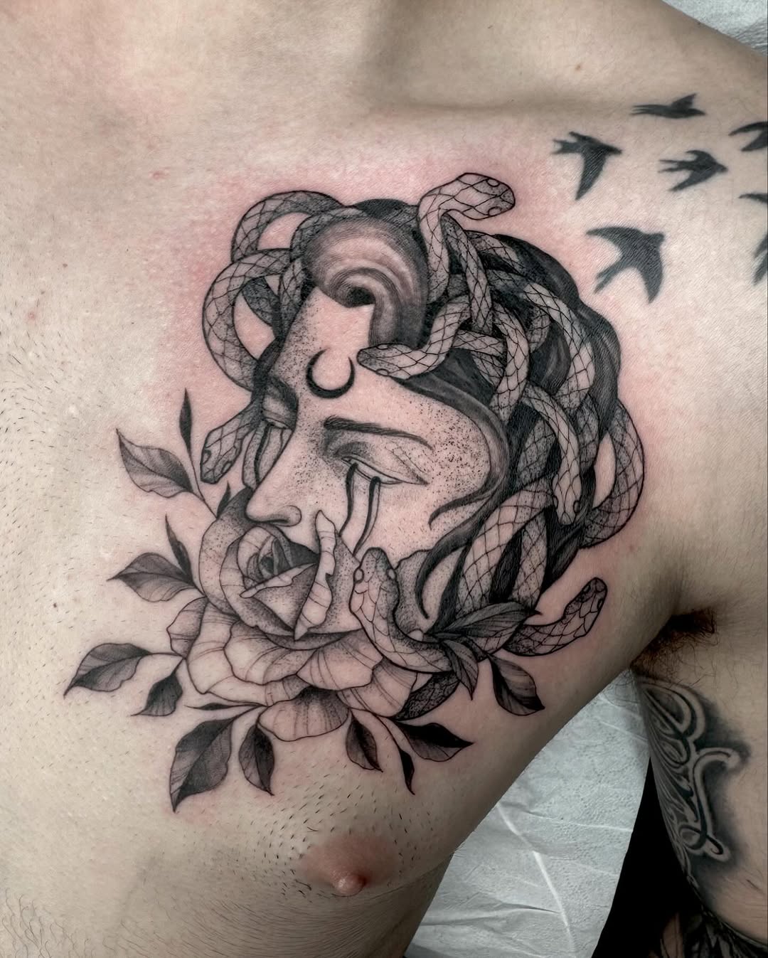 Intricate Medusa Tattoo with Floral Elements