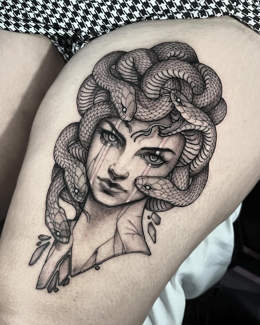 Bold Medusa tattoo with intricate snake details